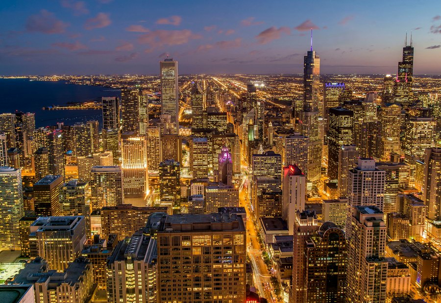 Modern city buildings at sunset.