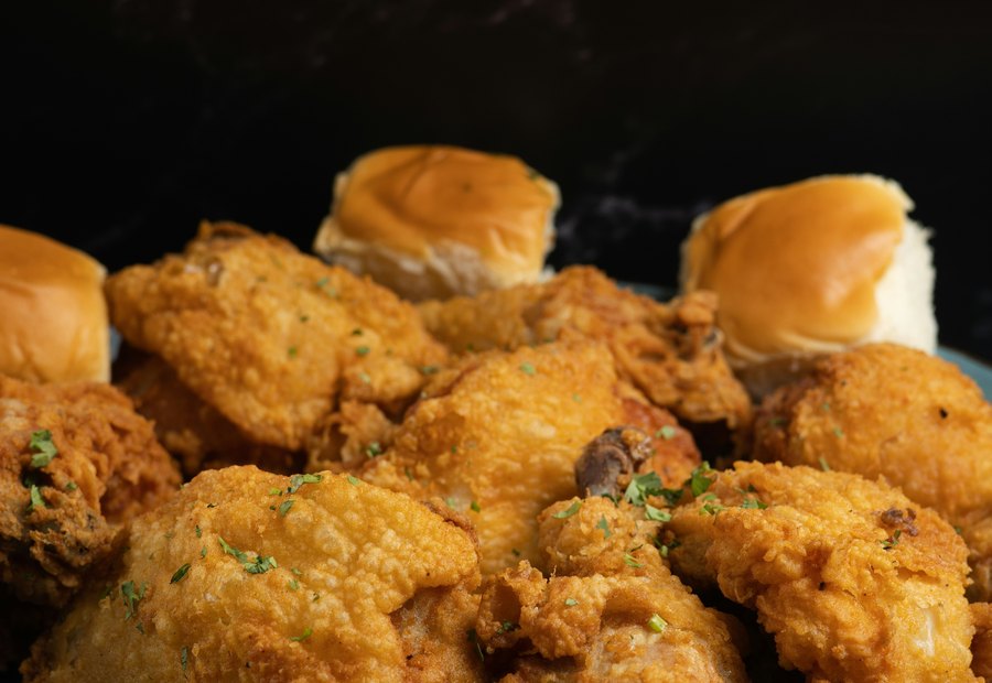 Fried chicken and chips on a plate.
